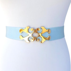 Light blue wide elastic waist belt with gold filigree clasp