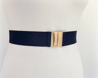 Navy blue elastic waist belt with gold clasp