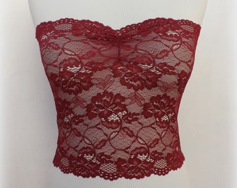 Top a tubo in pizzo elastico trasparente bordeaux senza spalline