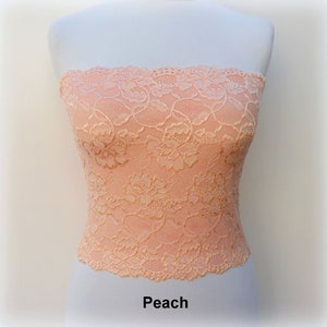 Elfenbeinfarbener elastischer Spitzenschlauch oben, trägerloser BH Peach