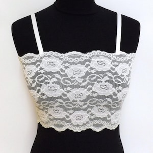 Bralette de encaje floral elástico transparente blanco con tirantes ajustables