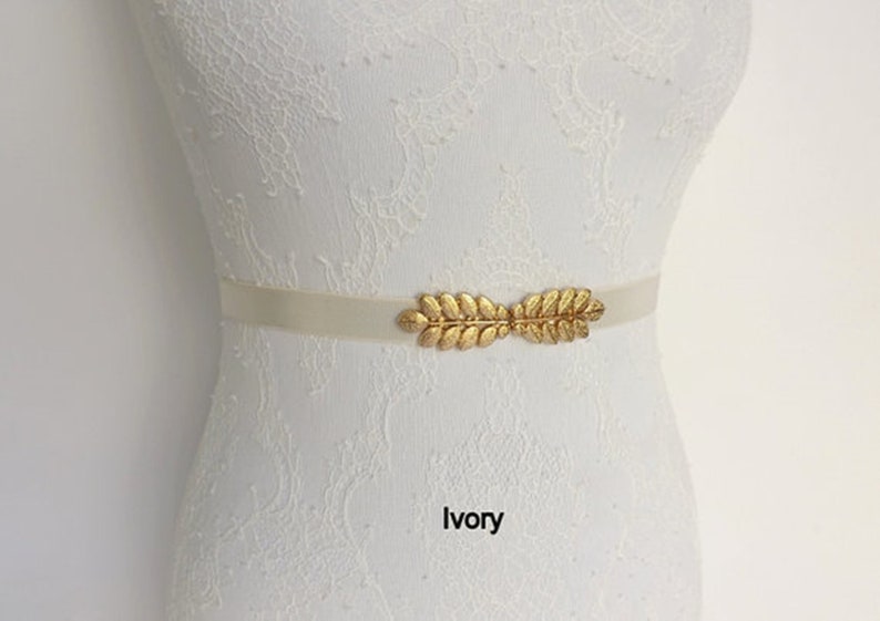 Women's gold elastic grecian leaf waist belt Ivory