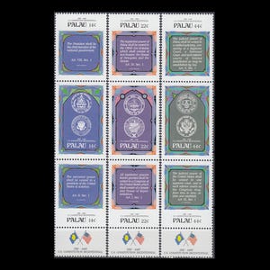 May include: A sheet of nine postage stamps from Palau commemorating the U.S. Constitution Bicentennial. The stamps feature text excerpts from the U.S. and Palau constitutions, government seals, and crossed flags, with denominations of 14c, 22c, and 44c.