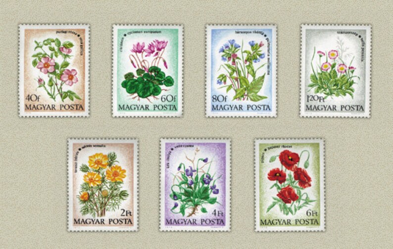 May include: A collection of seven vintage postage stamps featuring botanical illustrations of various flowers. Each stamp has a different floral design, including roses, cyclamen, and poppies, with the text "MAGYAR POSTA" and a denomination.
