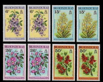 Dzikie kwiaty na brytyjskich znaczkach pocztowych Hondurasu z 1972 r. / Fioletowy wieniec, różowe drzewo trąbkowe, drzewo koralowe, biały Jemeri / Kolaż natury