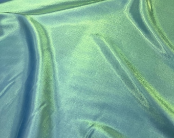 Stof: geweven: polyrayon: metallic groen gemerceriseerde stof: cerulean Verkocht op maat gesneden