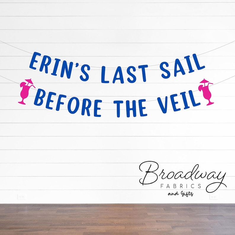 May include: A blue banner with the text "ERIN'S LAST SAIL BEFORE THE VEIL" is strung across a white wall. Pink cocktail graphics flank the text. The Broadway Fabrics and Gifts logo is at the bottom.