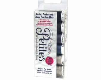 May include: A package of six spools of Cotton Now Petites embroidery thread. The spools are in shades of gray and blue. The package says "Easier, Faster and More Fun than Floss" and "One strand of 12 wt. Cotton Petites equals two strands of typical embroidery floss!"