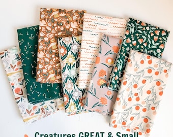 May include: A fabric bundle featuring various floral and nature-themed patterns in shades of green, brown, and peach. The bundle includes fabrics with designs of flowers, leaves, and orange-like fruits. The text "Creatures GREAT & Small Fabric Bundle" is displayed at the bottom.