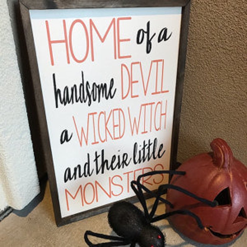 A Wicked Witch And Her Handsome Devil Live Here - Couple Personalized Custom Round Shaped Home Decor Witch Wood Sign - Halloween Gift For Witches, Husband Wife