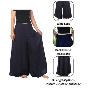 K&ouml;nnte beinhalten: Marineblaue, weit geschnittene Palazzo-Hose mit elastischem Bund hinten. Die Hose ist in drei Schrittl&auml;ngen erh&auml;ltlich: 53 cm, 62 cm und 67 cm.