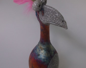 Pájaro dodo de 23 cm. Por Nolan, de Round Tree Pottery. Torneado y esculpido a mano. Horneado en raku.