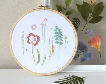 Herbarium hand embroidery pattern, a fresh and delicate design of flowers, sprigs and leaves