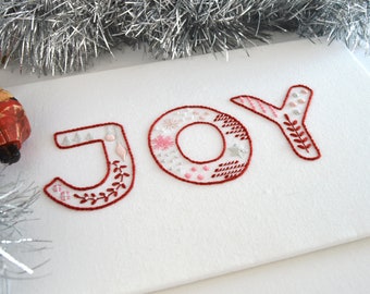 Joy hand embroidery pattern to spread good cheer during the festive season