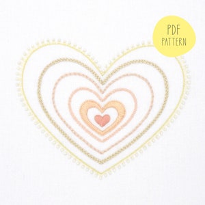 Radiant Heart, a hand embroidery pattern in dusty pink and gold for love, romance and weddings