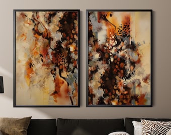 May include: Two framed abstract art pieces. The artwork features a blend of warm colors, including orange, brown, and beige, with black accents. The paintings are displayed above a dark gray sectional sofa, enhancing the room's decor.