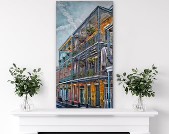 May include: A colorful, multi-story building with wrought iron balconies and hanging plants. The building has a teal blue exterior with yellow and orange accents. The building is located in a city setting.