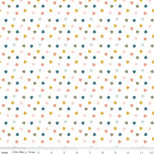 May include: White fabric with a repeating pattern of small hearts in various colors, including yellow, blue, pink, and green. The hearts are evenly spaced across the surface. The fabric is measured in inches.