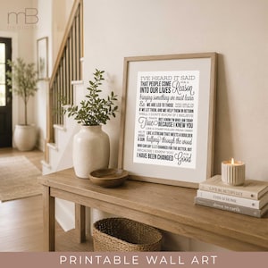 May include: A framed wall art print featuring black typography on a white background. The text reads: I've heard it said that people come into our lives for a reason, bringing something we must learn, and we are led to those who help us most to grow.