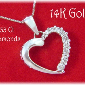 Jane seymour open 2024 heart key necklace