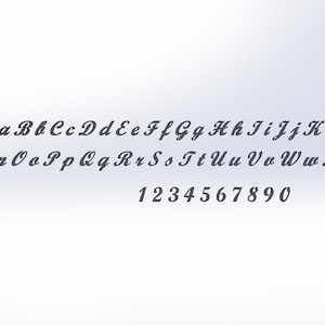 May include: A font alphabet with uppercase and lowercase letters and numbers 1 through 9. The font is a cursive script style.