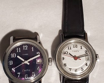 2 Timex watch faces for repair parts