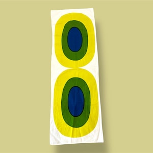 A Marimekko table cloth named Melooni designed by Maija isola in 1963, made in Finland