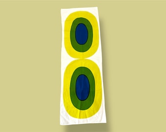A Marimekko table cloth named Melooni designed by Maija isola in 1963, made in Finland
