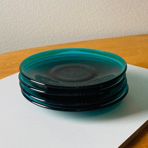A set of four glass plates from Nuutajärvi, Finland 1950s-1960s.
