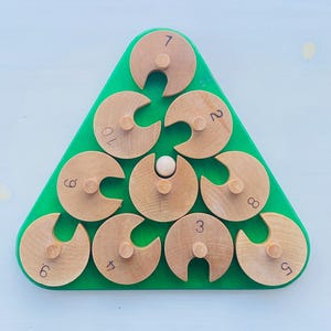 A museum piece/ vintage Finnish Aarikka wooden toy designed by Finnish designer Jorma Vennola, 1970s  for Aarikka Finland