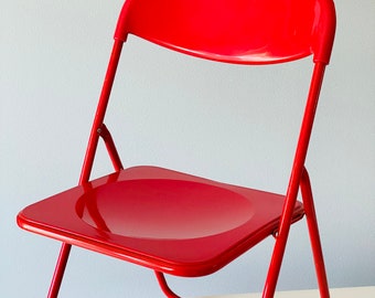Vintage Red Folding Chair named “ TED”made from metal and plastic by Niels Gammelgaard Mid Century Dining Chairs, Made in 1970s