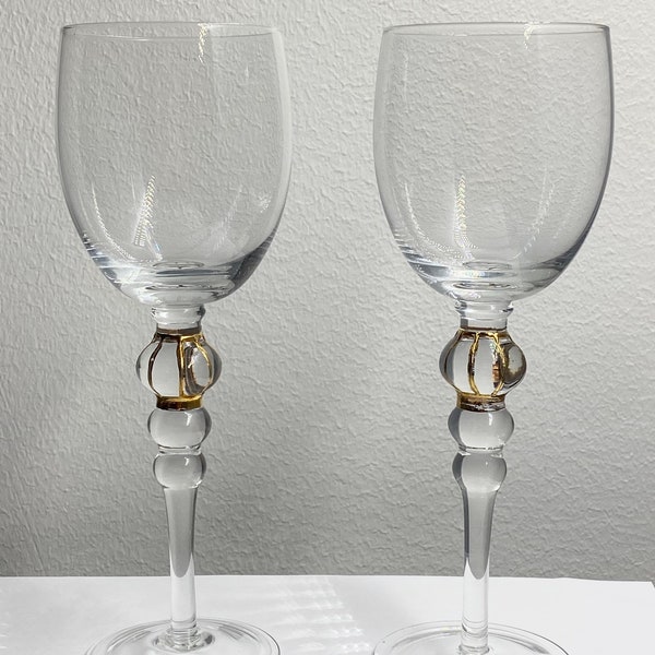 A pair of handmade gilded handmade wine glass by Pentik,Made in Finland