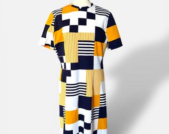 A classic and beautiful Vintage Geometric dress, by brand Mr. Jack Dallas, a clothing line known for its designs originating in Texas