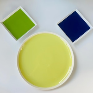 A set of three vintage Arabia Finland ceramic plates by designer James irvine, made in Finland