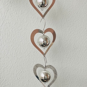 A big vintage Aarikka metal mobile with 3 parts designed by Kaija Aarikka, Made in Finland, 1970s