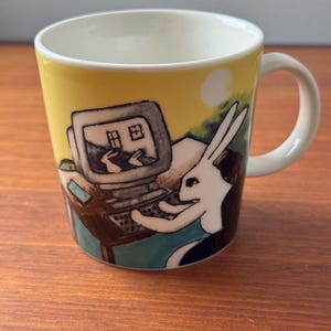 Vintage Arabia Finland ceramic mug named “Computer Bunnies” designed by Heljä Liukko-Sundström, 2000, Made in Finland
