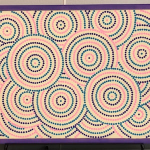 Hand painted cork board in pink, blue and purple.