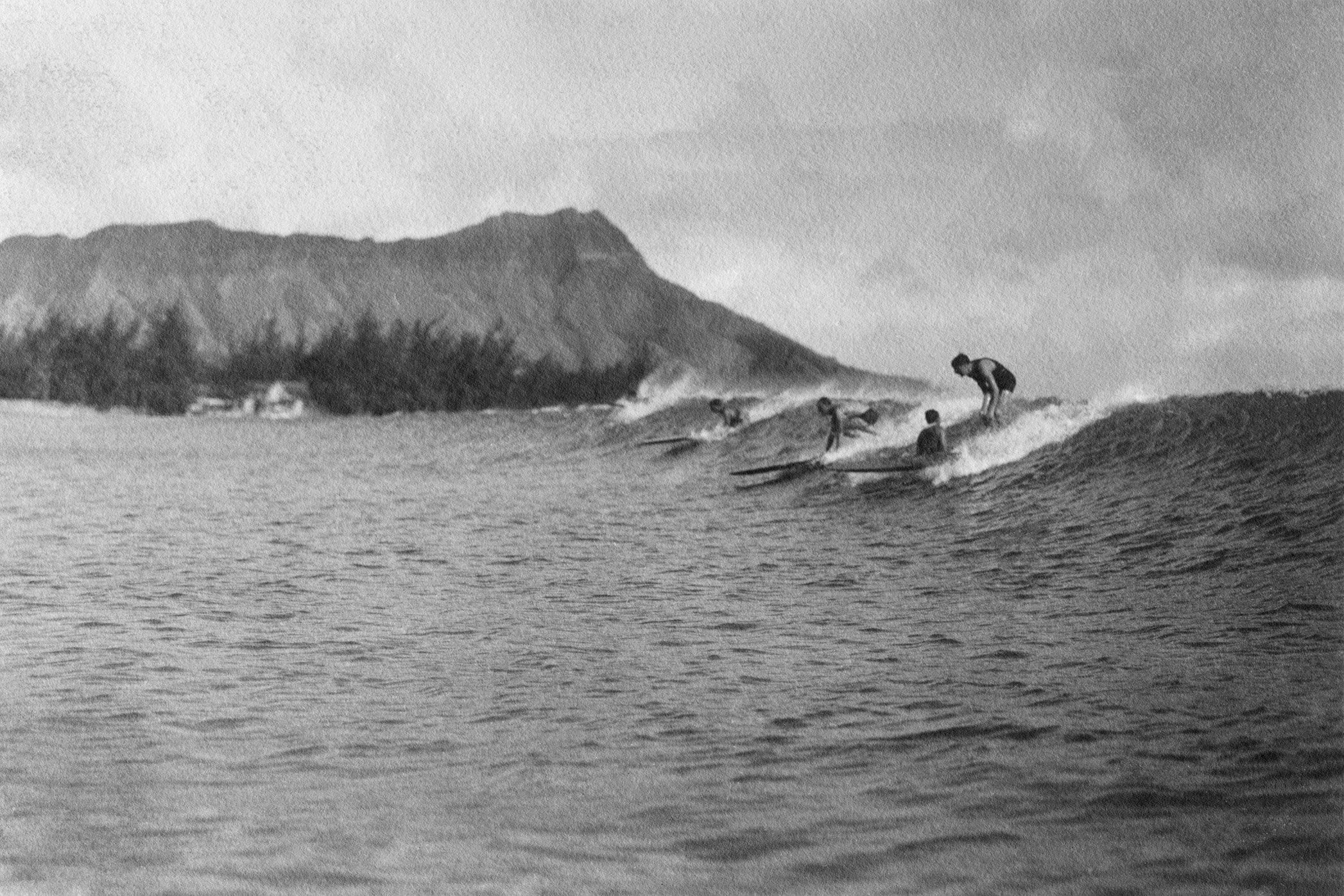 Four Surfers and one Passenger Share a Wave, Waikiki Oahu - Vintage Hawaii black and white photo print