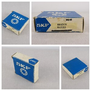 May include: A blue and white cardboard box with the SKF logo and the text "AK43131 K43312" printed on it. The box is labelled with the date "1981-03".