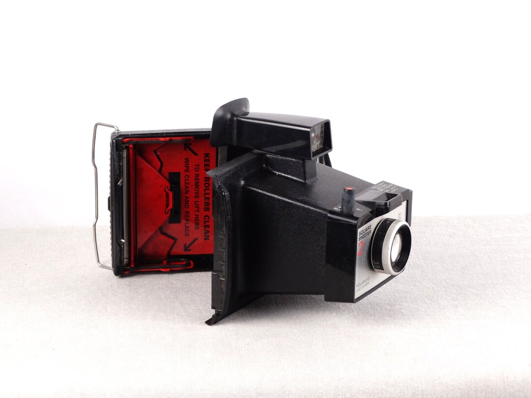 Ancien appareil photo Polaroid Band Camera Polatriplet