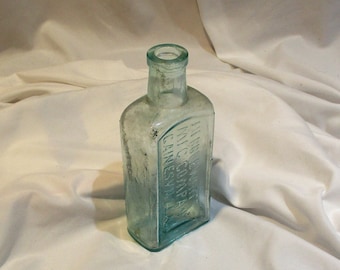 Old Glass Bottle, Quack Medicine Glass Salvage, Antique Aqua Embossed Bottle, Hebblewhite Manufacturing Company, Cainesville, New York