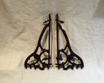 Industrial Metal Shelf Brackets: Salvaged Equipment Corbels, Scroll Design