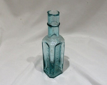 Antique Embossed Warner's Bottle: 19th Century English Quack Medicine
