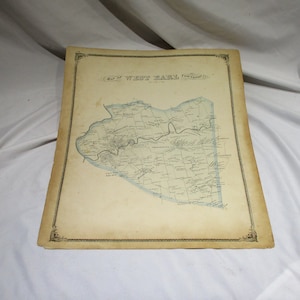 May include: An antique map of West Earl Township, featuring detailed geographical information. The map is printed on aged paper with a decorative border. The map's color palette includes shades of blue and beige, with text indicating various locations.