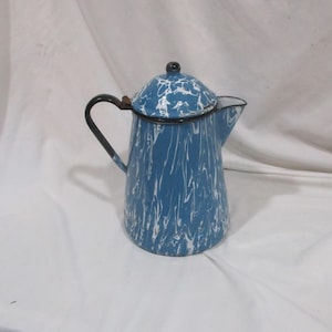 May include: Blue and white enamel coffee pot with a black handle and lid. The pot has a marbled design.