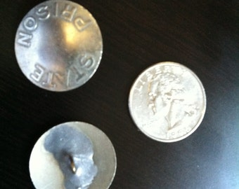 Gemarkeerde knopen met vintage staatsgevangenis