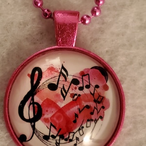 Music; treble clef; necklace; pendant