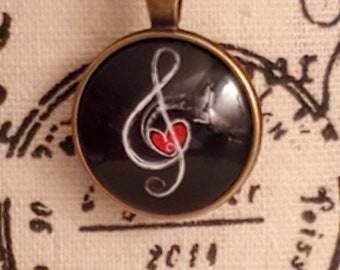 Music; treble clef; necklace; pendant