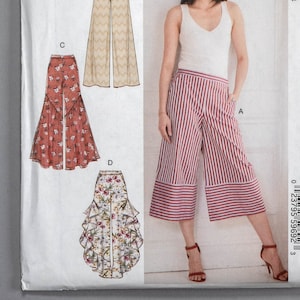 May include: McCall's sewing pattern M7786 featuring a woman wearing striped culottes. The pattern includes illustrations of different pant styles, including a pair with a zigzag pattern and another with floral ruffles. Size E5 (14-16-18-20-22).