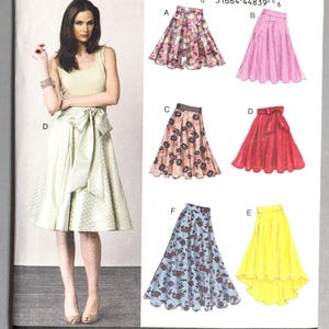 May include: Vogue Patterns Easy options sewing pattern V8882. The pattern features several skirt designs, including A with a floral print, B in pink, C with a floral print, D in red, F in blue floral, and E in yellow. The size range is 14-16-18-20-22.